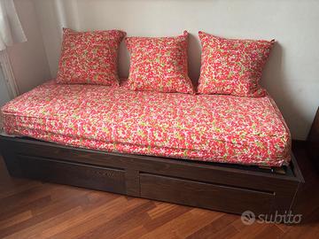 copriletto singolo rosso con cuscini in vera piuma