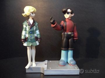 Metropolis (Otomo - Tezuka) - Tima e Rock statue