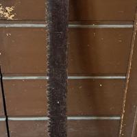 Sega d'epoca per taglio tronchi a due uomini