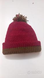cappello con pon-pon 