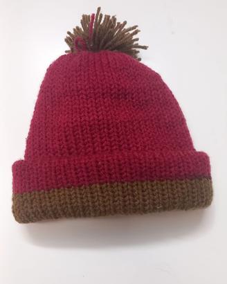 cappello con pon-pon 