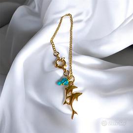 Bracciale dorato con doppio charm