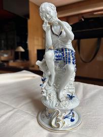 Statua Porcellana d'Arte - Ragazzo Seduto 