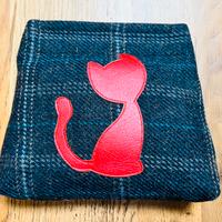 Pochette scozzese con gatto rosso