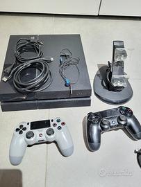 Ps4 slim 1 tb + 2 joypad + auricolare e giochi