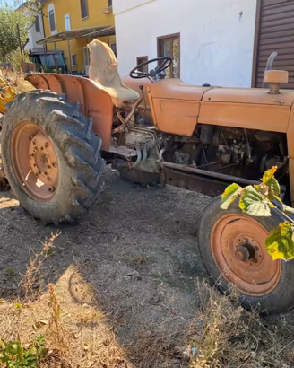 Trattore om 615 braccio escavatore