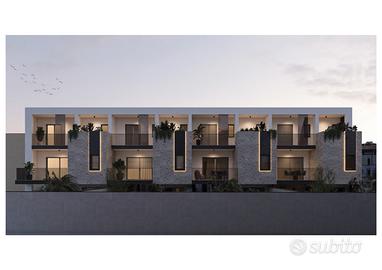 Villette a schiera su tre livelli con giardino