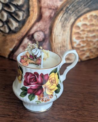 candela artigianale in tazza vintage 