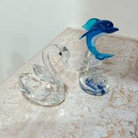 Coppia statuine Delfino e Cigno in vetro di Murano