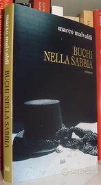 Buchi nella sabbia