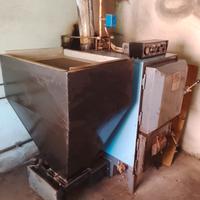 caldaia per riscaldamento a sanza a pellet e legno