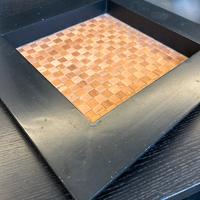 Svuotatasche di design in legno