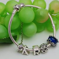 BRACCIALE PANDORA CON 6 CHARMES 