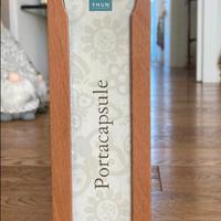 Porta capsule