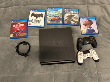 Ps 4 slim 1 TB 2 geympad e 5 gioci