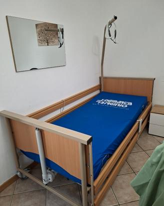 Letto ortopedico elettrico e materasso-nuovo.