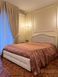 Copriletto color rosa antico