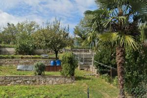 PORZIONE DI CASA con GIARDINO-ORTO E CANTINE