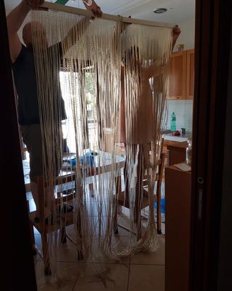 Tenda di plastica pesante da esterno per infisso. 