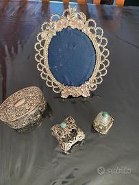 4 oggetti in metallo argentato