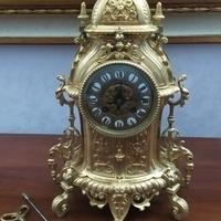 orologio con pendolo in ottone 