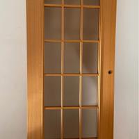 Porta “Scrigno” con vetri all’inglese