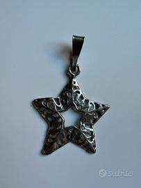 Ciondolo stella in argento traforato. Vintage