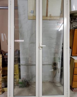 porta completa a due battenti bianca  in alluminio