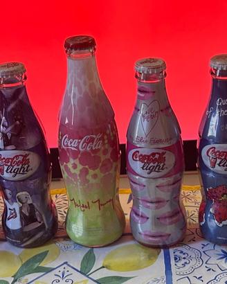 Collezione Bottiglie Coca-Cola Vintage e Rare