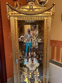 Vetrina oro Swarovski 300€  quadro oro angeli 100€