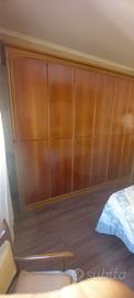 Camera da letto in legno radica di noce
