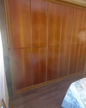 Camera da letto in legno radica di noce