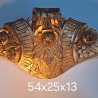 Antico fregio in legno