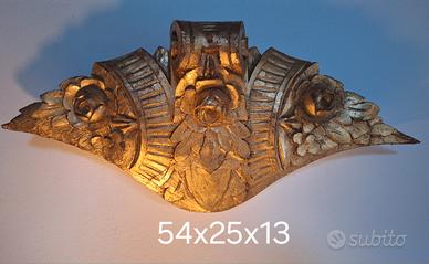 Antico fregio in legno