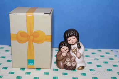Presepe Thun - Bimbi che mangiano il pane -