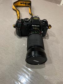 Nicon N2000 reflex a rullino con obbiettivo