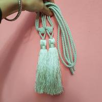 Coppia di ferma tende. / Nuovi.