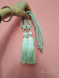 Coppia di ferma tende. / Nuovi.