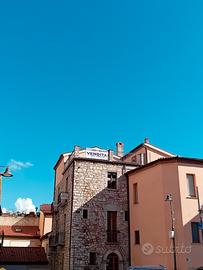 Appartamento con terrazzo in stabile ricostruito;