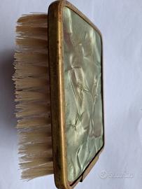 Spazzola abiti vintage bordo ottone