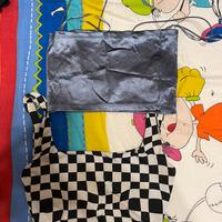 top argento e top a scacchi