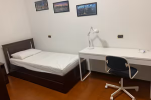 Camera / Stanza in appartamento in condivisione