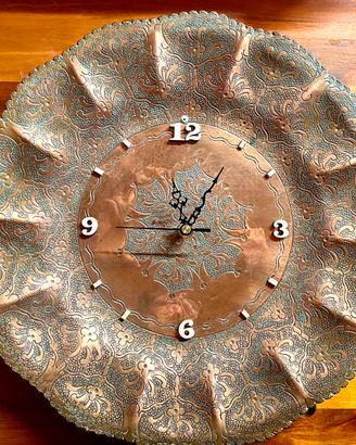 Orologio in rame antico