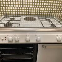 cucina gas con forno elettrico e piastra elettrica