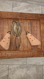 Applique in ferro battuto e terracotta 