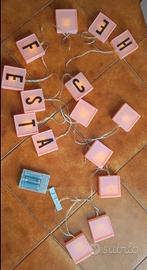 catena luminosa con lettere