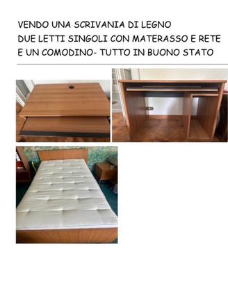 Due letti singoli con materasso e una scrivania