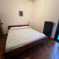 Letto matrimoniale in noce massello