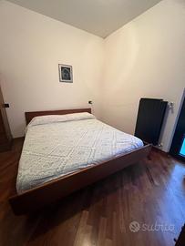 Letto matrimoniale in noce massello