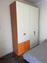 Armadio capiente 4 ante + cassetti